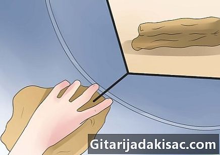 Como remover uma mancha de tinta de um tambor de secadora