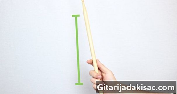 Как да завъртите барабанна пръчка
