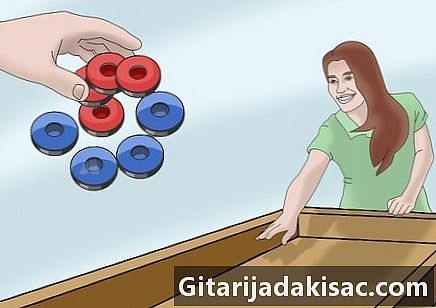 Hoe shuffleboard te spelen