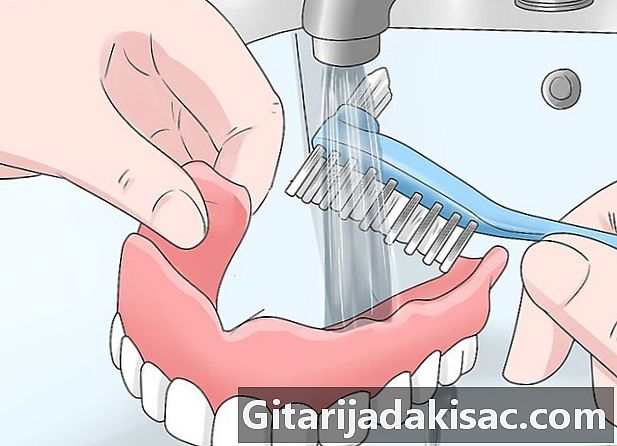 Cómo mantener una dentadura inferior en su lugar